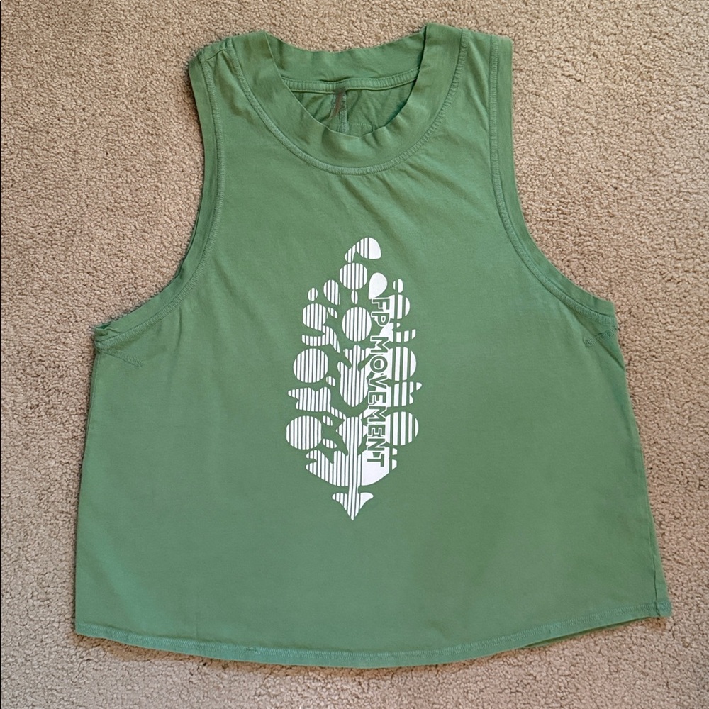FP Movement by Free People Green Tank Top 
Relaxed style hip length